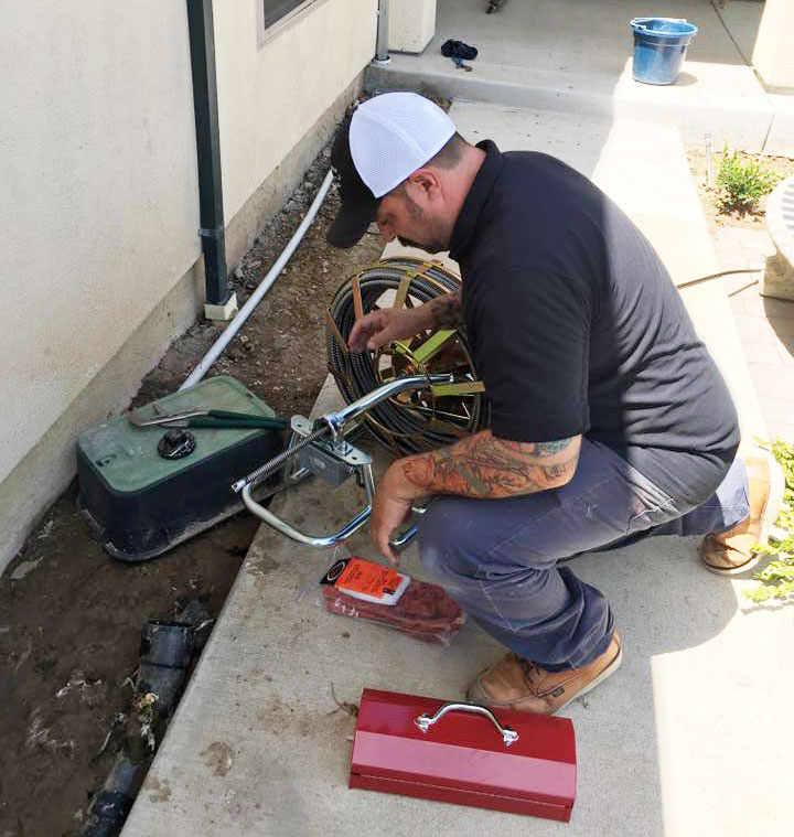simpson plumbing contractor snaking a residential drain in mountain house, california