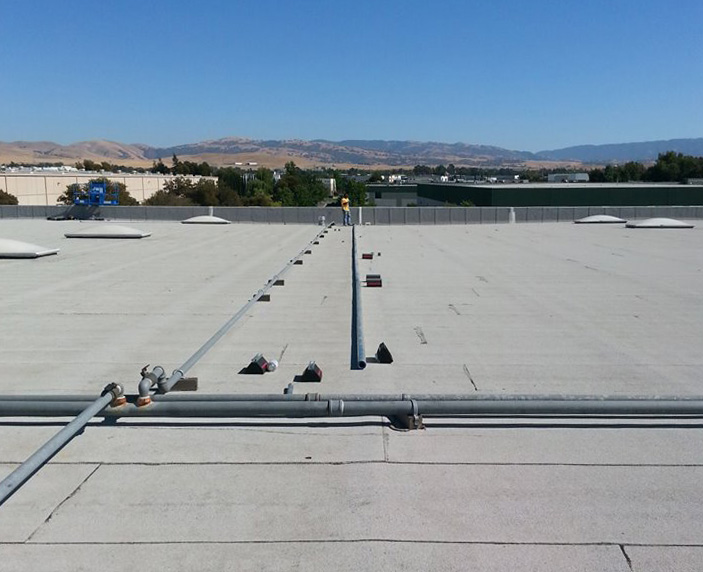 Installing a gas line on a business's rooftop in Tracy, California