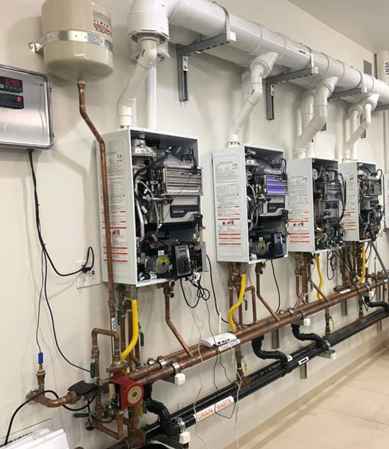 array of Navien tankless water heaters for training