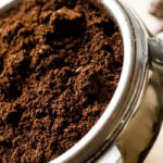 is it OK to put coffee grounds down the toilet?