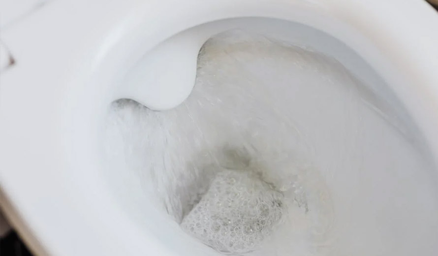 why does my toilet bubble when the bathtub drains?