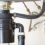 why Is my garbage disposal tripping my circuit breaker?